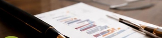Strategic advisory report and pen on a desk